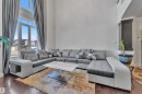 Soaring ceilings with expansive windows - 10915 175 Avenue Nw, Edmonton, AB  - Indoor Photo Showing Living Room 