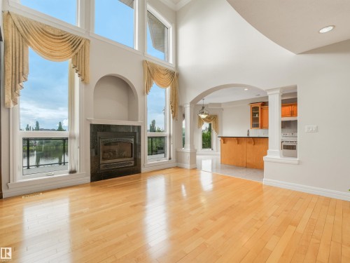 22 Shores Drive, Leduc, AB - Indoor Photo Showing Living Room With Fireplace