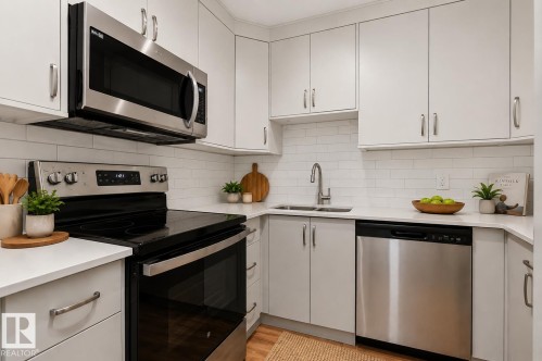 #107 10138 116 St Nw, Edmonton, AB - Indoor Photo Showing Kitchen With Stainless Steel Kitchen With Double Sink With Upgraded Kitchen