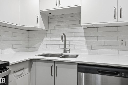 #107 10138 116 St Nw, Edmonton, AB - Indoor Photo Showing Kitchen With Double Sink With Upgraded Kitchen