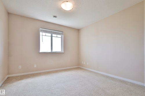 #213 6925 199 St Nw, Edmonton, AB - Indoor Photo Showing Other Room