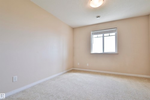 #213 6925 199 St Nw, Edmonton, AB - Indoor Photo Showing Other Room
