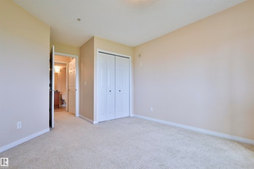 #213 6925 199 St Nw, Edmonton, AB - Indoor Photo Showing Other Room