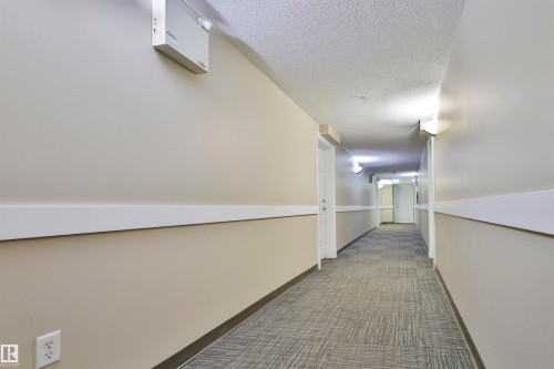 #213 6925 199 St Nw, Edmonton, AB - Indoor Photo Showing Other Room
