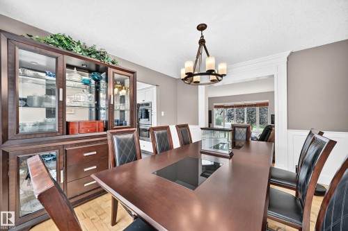 Tray ceiling with a bronze-finish chandelier - #38 24512 Sturgeon Rd, Rural Sturgeon County, AB 