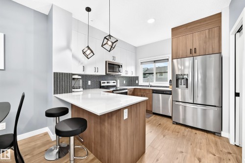 #15 6214 Cartmell Ct Sw, Edmonton, AB - Indoor Photo Showing Kitchen With Stainless Steel Kitchen With Upgraded Kitchen