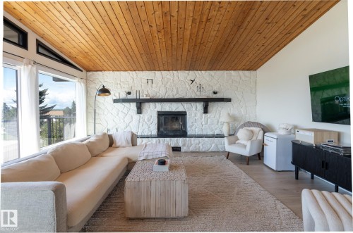 5019 42 Street, Cold Lake, AB - Indoor Photo Showing Living Room With Fireplace