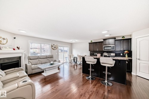 6419 18 Avenue Sw, Edmonton, AB - Indoor Photo Showing Other Room With Fireplace
