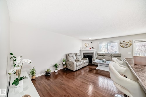 6419 18 Avenue Sw, Edmonton, AB - Indoor Photo Showing Other Room With Fireplace