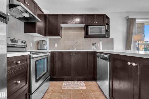 #2115 9357 Simpson Dr Nw, Edmonton, AB - Indoor Photo Showing Kitchen With Stainless Steel Kitchen