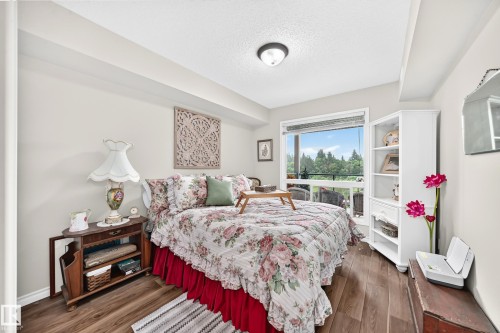 #209 102 Bridgeport Cx, Leduc, AB - Indoor Photo Showing Bedroom