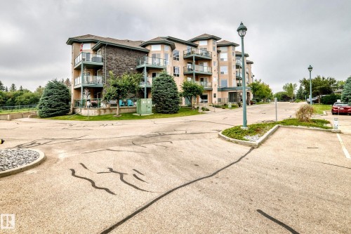 #209 102 Bridgeport Cx, Leduc, AB - Outdoor With Balcony With Facade