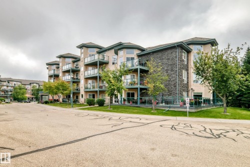#209 102 Bridgeport Cx, Leduc, AB - Outdoor With Balcony With Facade
