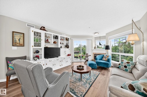 #209 102 Bridgeport Cx, Leduc, AB - Indoor Photo Showing Living Room