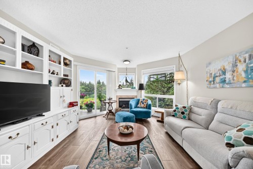 #209 102 Bridgeport Cx, Leduc, AB - Indoor Photo Showing Living Room