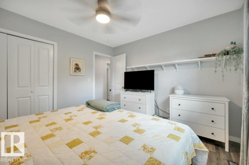 Recessed lighting, vinyl plank flooring, and a ceiling fan with integrated lighting - #138 5231 51 St, Bon Accord, AB - Indoor Photo Showing Bedroom