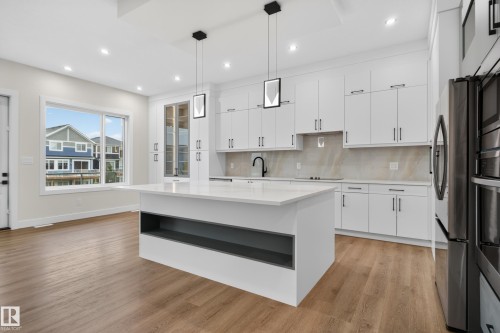 132 Edgewater Circle, Leduc, AB - Indoor Photo Showing Kitchen With Upgraded Kitchen