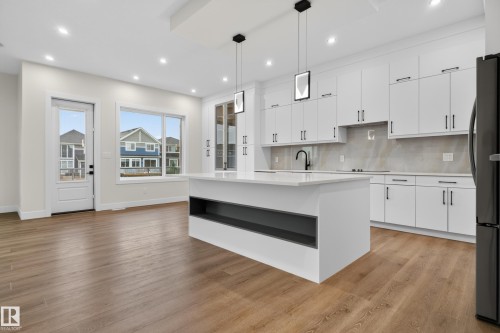 132 Edgewater Circle, Leduc, AB - Indoor Photo Showing Kitchen With Upgraded Kitchen