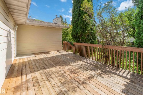 Expansive wood deck with a full-height railing, leading to exterior siding - 14725 43A Avenue Nw, Edmonton, AB - Outdoor With Deck Patio Veranda With Exterior