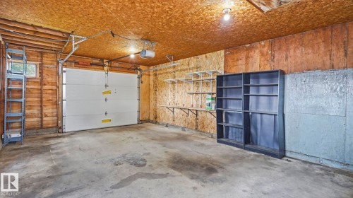 12002 39 Street Nw, Edmonton, AB - Indoor Photo Showing Garage