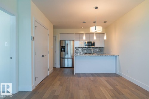 #401 11969 Jasper Av Nw, Edmonton, AB - Indoor Photo Showing Kitchen