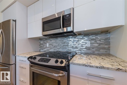 #401 11969 Jasper Av Nw, Edmonton, AB - Indoor Photo Showing Kitchen