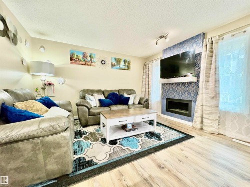 1824 Rutherford Road Sw, Edmonton, AB - Indoor Photo Showing Living Room With Fireplace