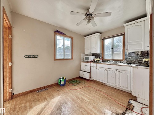 6209 106 Street Nw, Edmonton, AB - Indoor Photo Showing Kitchen With Double Sink