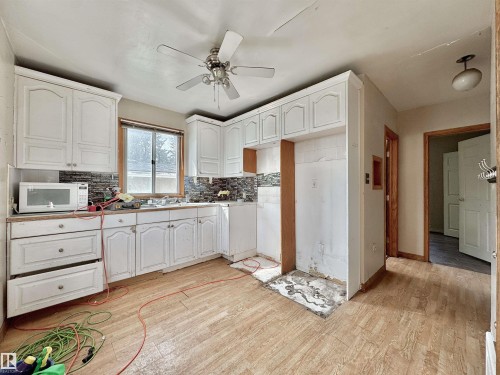 6209 106 Street Nw, Edmonton, AB - Indoor Photo Showing Kitchen With Double Sink