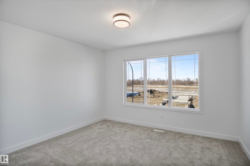 31 Leawood Link, Spruce Grove, AB - Indoor Photo Showing Other Room