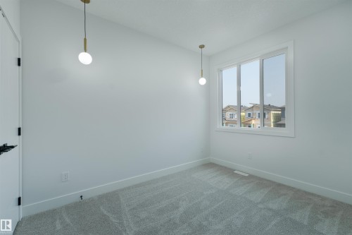 573 Ashgrove Circle, Leduc, AB - Indoor Photo Showing Other Room