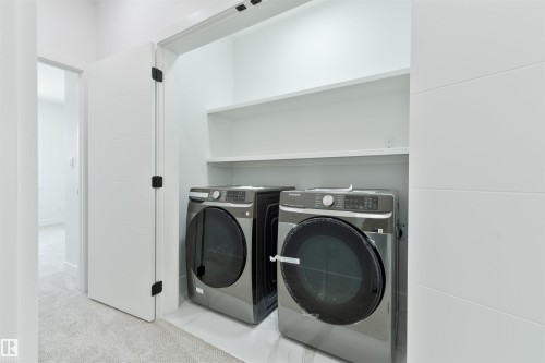 573 Ashgrove Circle, Leduc, AB - Indoor Photo Showing Laundry Room