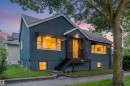 Stucco exterior with a peaked roofline and prominent front entry - 8759 78 Avenue Nw, Edmonton, AB  - Outdoor 