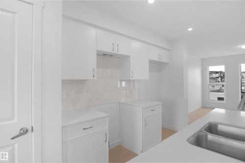 37 Leawood Link, Spruce Grove, AB - Indoor Photo Showing Kitchen With Double Sink