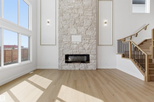 529 Ashgrove Circle, Leduc, AB - Indoor Photo Showing Living Room With Fireplace