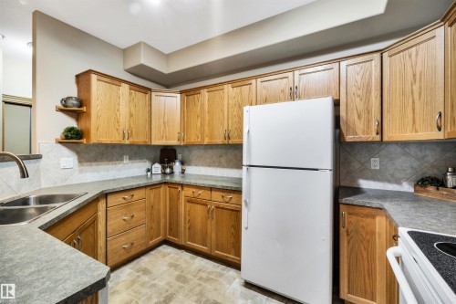 #104 612 111 St Sw, Edmonton, AB - Indoor Photo Showing Kitchen With Double Sink