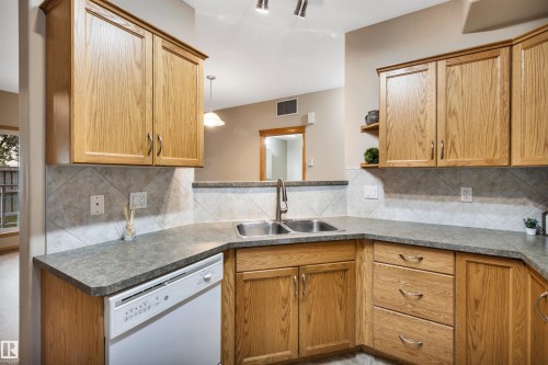 #104 612 111 St Sw, Edmonton, AB - Indoor Photo Showing Kitchen With Double Sink