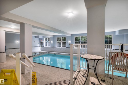 #104 612 111 St Sw, Edmonton, AB - Indoor Photo Showing Other Room With In Ground Pool