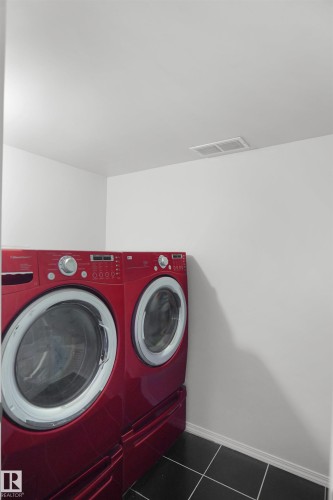 Additional content - 907 Jordan Crescent Nw, Edmonton, AB - Indoor Photo Showing Laundry Room