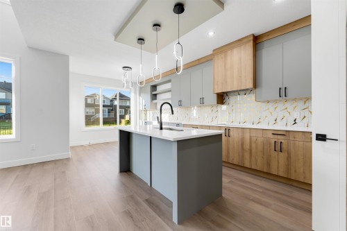 7023 177 Avenue Nw, Edmonton, AB - Indoor Photo Showing Kitchen With Upgraded Kitchen