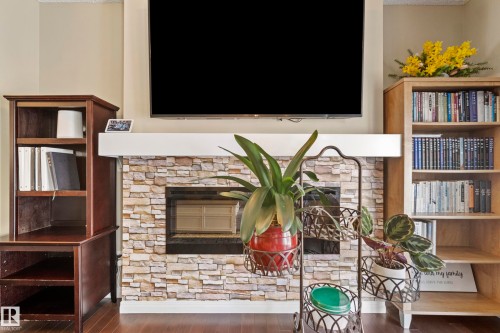 #81 4050 Savaryn Dr Sw, Edmonton, AB - Indoor With Fireplace