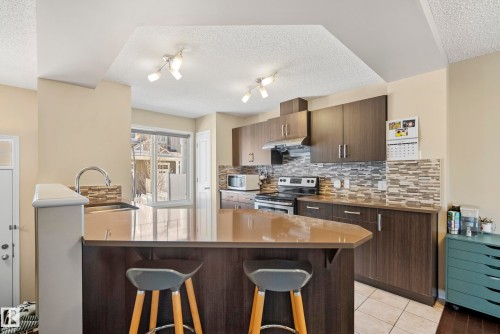 #81 4050 Savaryn Dr Sw, Edmonton, AB - Indoor Photo Showing Kitchen With Upgraded Kitchen