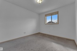 First upstairs bedroom, can fit a queen or double bed with space! - 