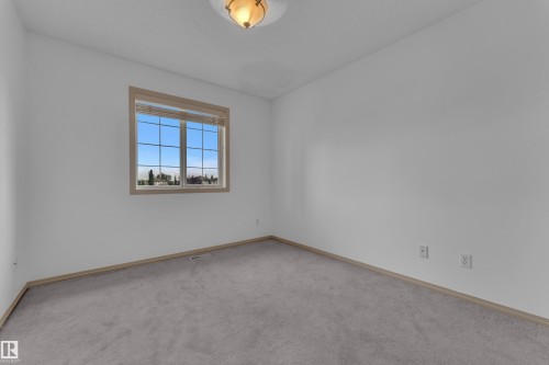 Second upstairs bedroom, well sized, perfect for a kids room or home gym! - 14031 136 Street Nw, Edmonton, AB - Indoor Photo Showing Other Room