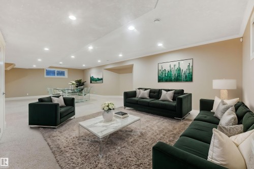 Recessed lighting illuminates the carpeted floor and neutral wall tones - 27 Kingdom Place, Leduc, AB - Indoor
