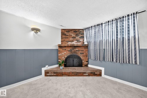 15020 88 Street Nw, Edmonton, AB - Indoor Photo Showing Other Room With Fireplace