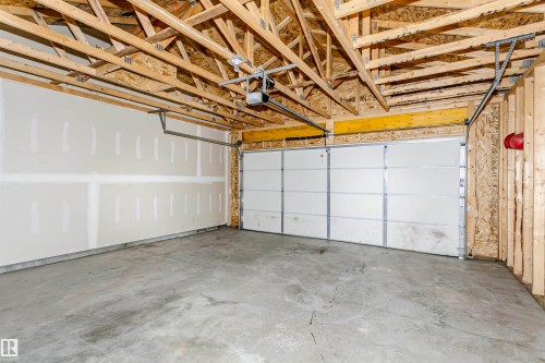 8103 Chappelle Way Sw, Edmonton, AB - Indoor Photo Showing Garage