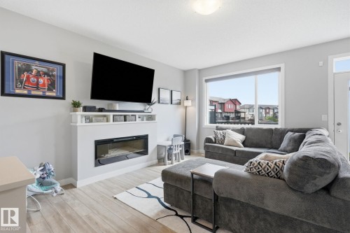 #73 16903 68 St Nw, Edmonton, AB - Indoor Photo Showing Living Room With Fireplace