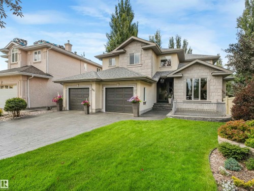 Stone and stucco exterior with multiple gables - 967 Lamb Crescent Nw, Edmonton, AB - Outdoor With Facade