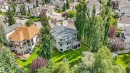Expansive property featuring a large residence, a secondary building, and mature trees - 967 Lamb Crescent Nw, Edmonton, AB  - Outdoor With View 